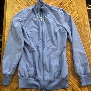 Light blue lightweight jacket with zipper pockets XS